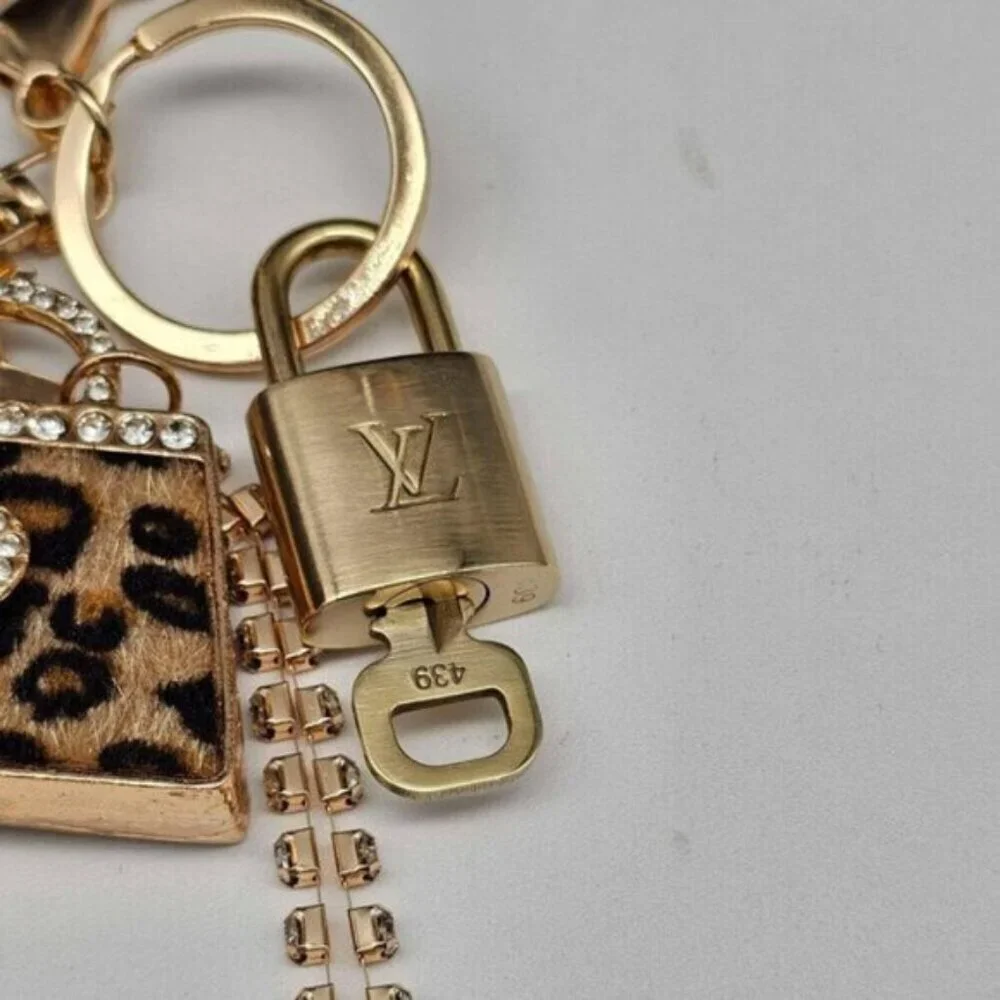 Authentic Louis Vuitton Lock & Key with unbranded Leopard Bagcharm, Keycharm